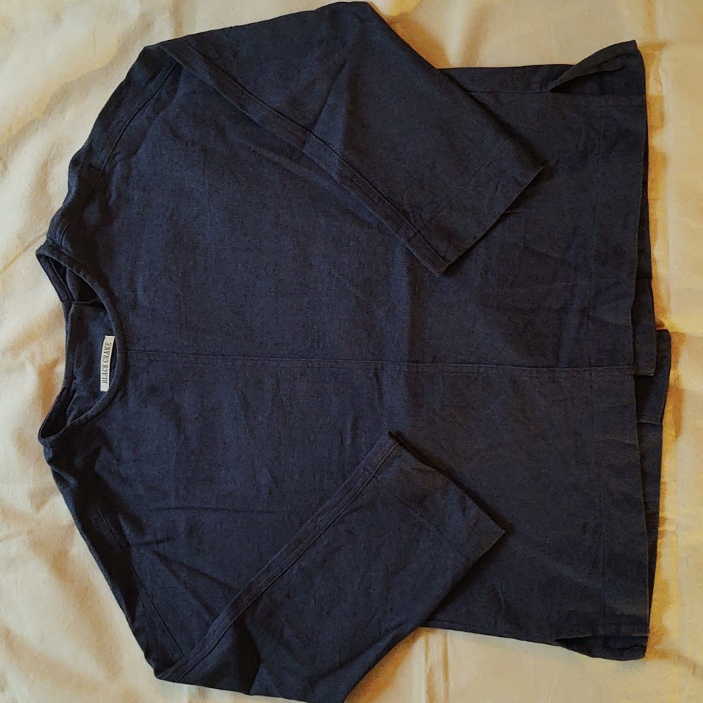 Black Crane Open Back blouse.